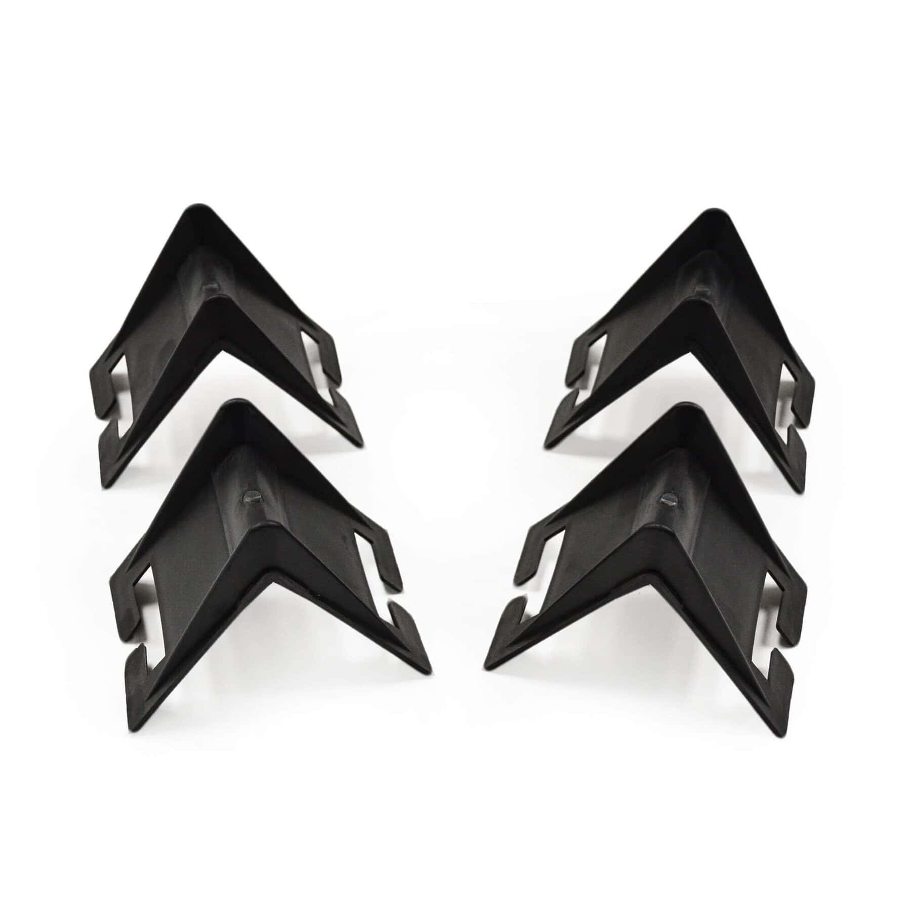 Four black plastic corner protectors arranged on a white background